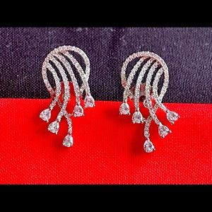 Beautiful ss/rhodium pierced post earrings, very dressy and unique style